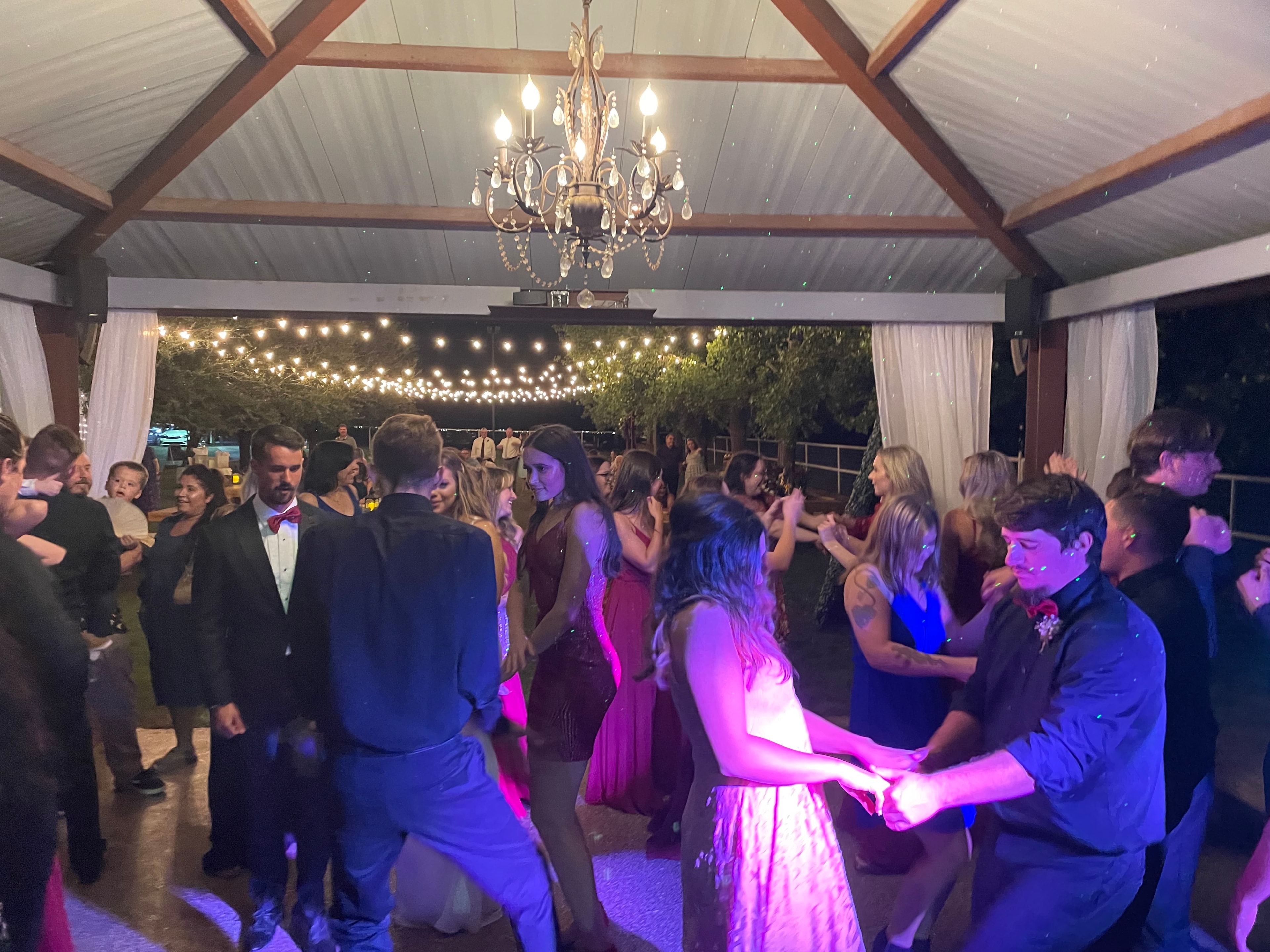 Corporate event guests mingling and dancing